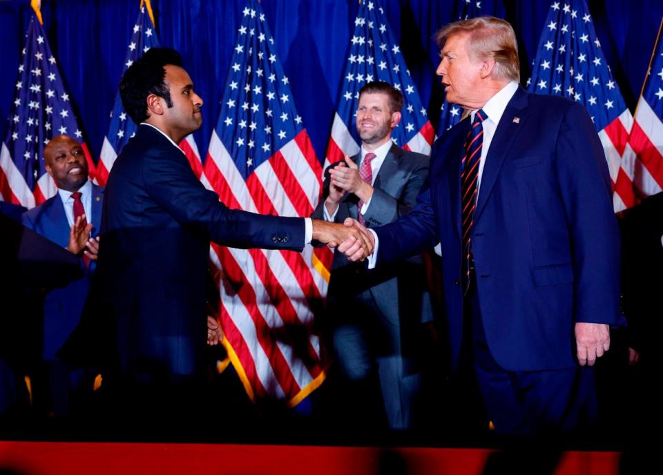 PHOTO: Republican presidential candidate and former U.S. President Donald Trump shakes hands with former Republican candidate Vivek Ramaswamy during Trump's primary night rally, Jan. 23, 2024, in Nashua, New Hampshire.  (Chip Somodevilla/Getty Images)