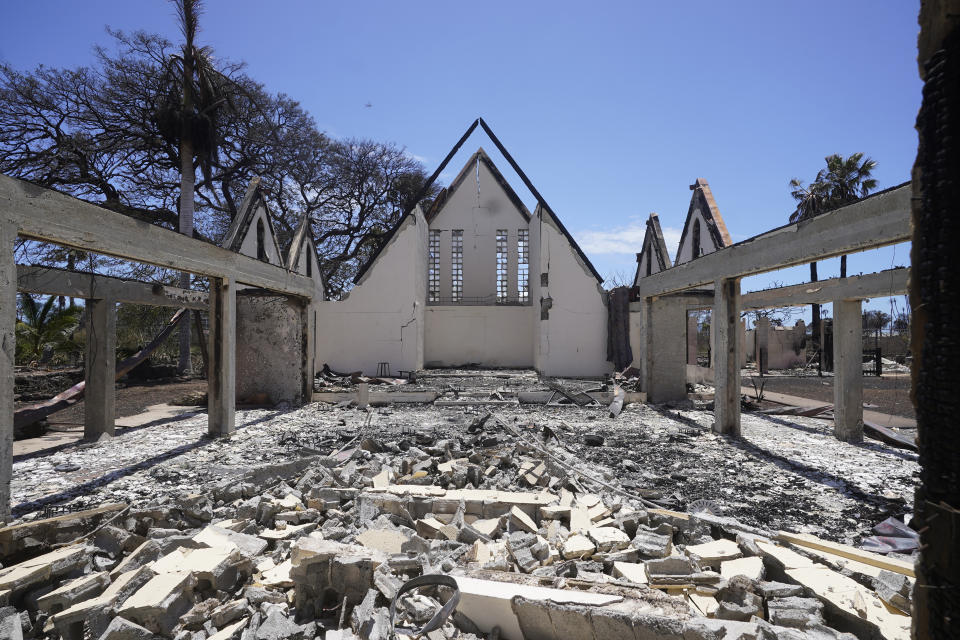 The destroyed Waiola Church is shown following wildfire, Friday, Aug. 11, 2023, in Lahaina, Hawaii. (AP Photo/Rick Bowmer)