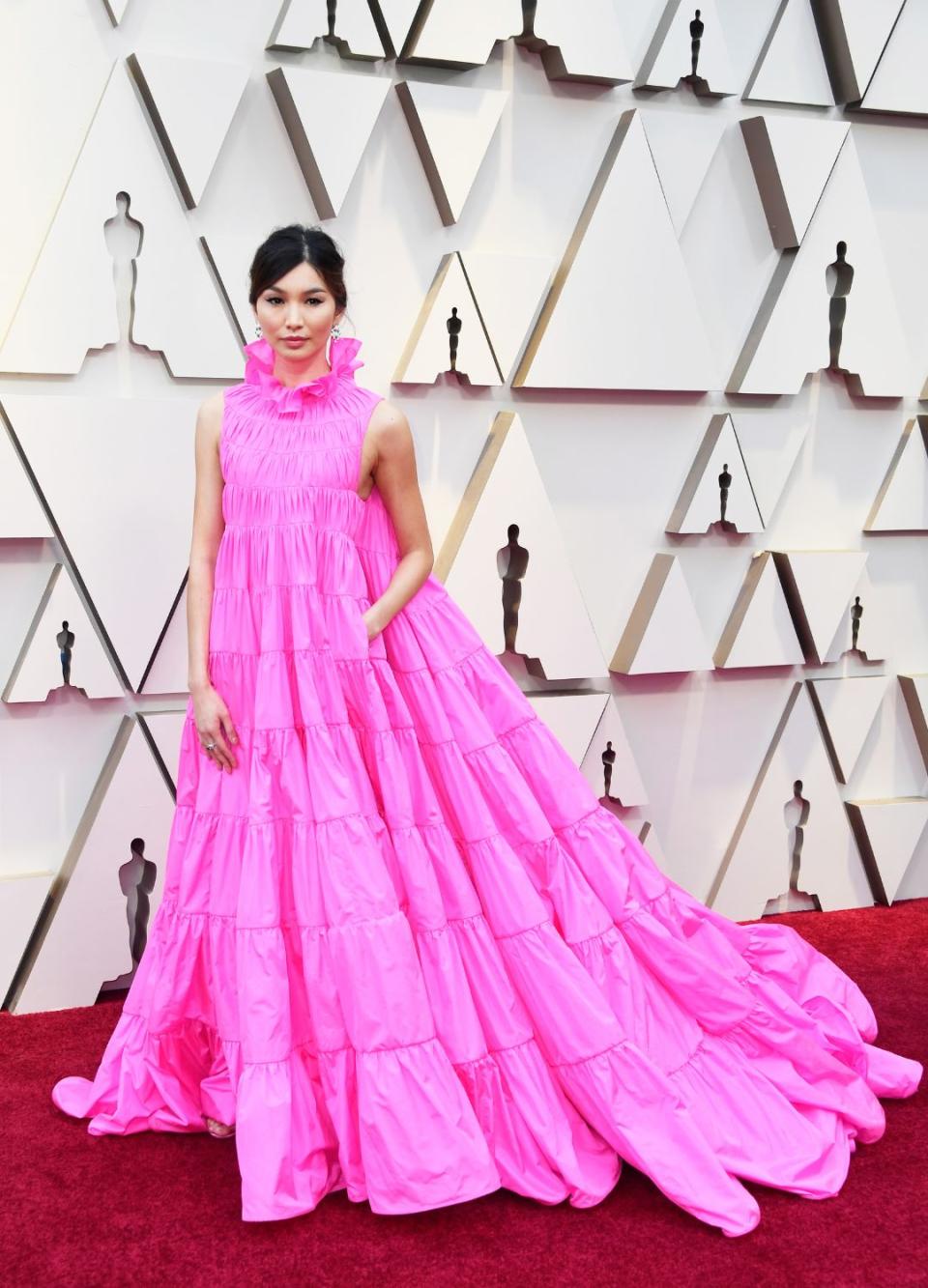 <p> Gemma Chan was delivering Barbiecore before it was even a thing. Chan wore a stunning statement parachute gown designed by Valentino at the 2019 Oscars. The dress allowed her to make a dramatic entrance that night and the ruffled collar is just the perfect finishing touch. </p>