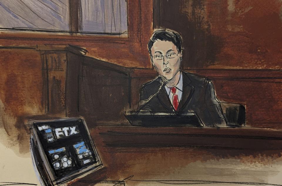 This courtroom sketch shows FTX co-founder Gary Wang on the witness stand as he testifies, during FTX co-founder Sam Bankman Fried's fraud trial, Friday, Oct. 6, 2023 in New York. (AP Photo/Elizabeth Williams)