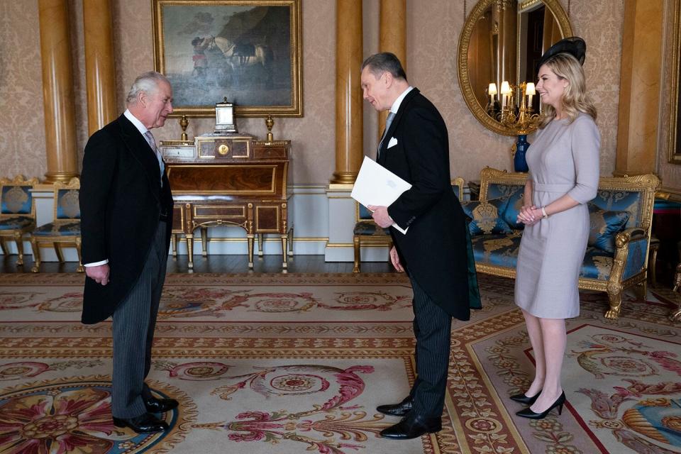 Britain's King Charles III receives Lithuania's Ambassador to the United Kingdom, Eitvydas Bajarunas and his wife Giedre Zickyte during an audience at Buckingham Palace in London on December 8, 2022.