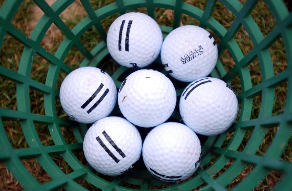 02-12-04, Tuscaloosa, Ala..,  Golf balls at Ol Colony Golf Course on Watermelon Road Thursday afternoon. (Tuscaloosa News/Jason Getz)