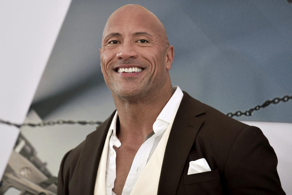 FILE - In this July 13, 2019, file photo, Dwayne Johnson attends the premiere of "Fast & Furious Presents: Hobbs & Shaw," in Los Angeles. Johnson’s new NBC comedy “Young Rock,” is a coming-of-age story inspired by his challenging childhood and youth. (Photo by Richard Shotwell/Invision/AP, File)