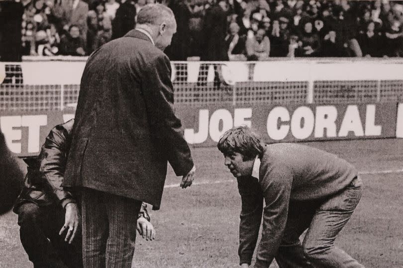 Ernie Ashley running on to the pitch to meet Bill Shankly after the 1974 FA Cup Final