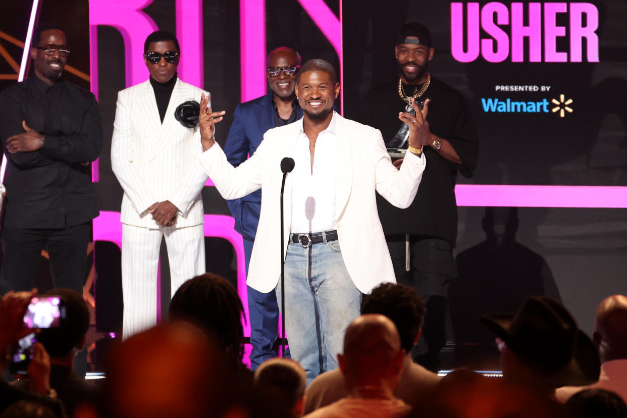 Usher onstage.