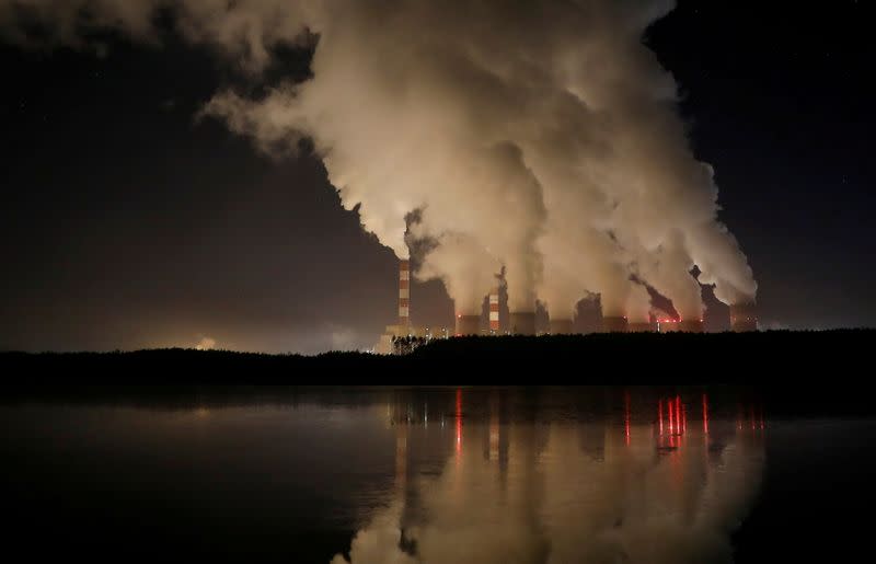 FILE PHOTO: Smoke and steam billows from Belchatow Power Station