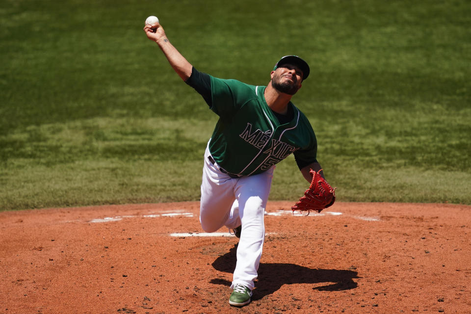 Mexico's Manuel Barrera pitches during a baseball game against Israel at Yokohama Baseball Stadium during the 2020 Summer Olympics, Sunday, Aug. 1, 2021, in Yokohama, Japan. (AP Photo/Matt Slocum)