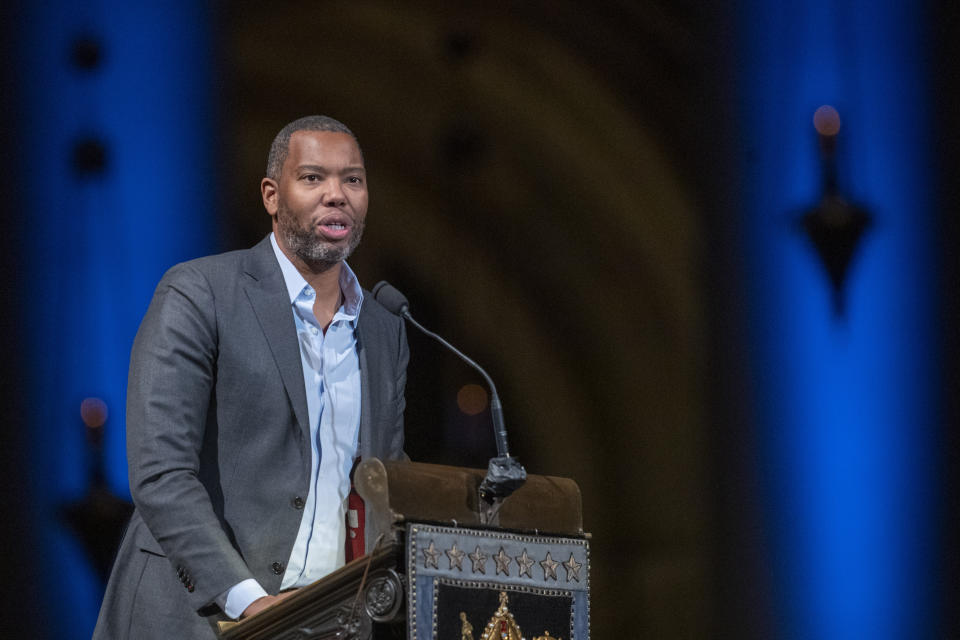 Author Ta-Nehisi Coates speaks during the Celebration of the Life of Toni Morrison, Thursday, Nov. 21, 2019, at the Cathedral of St. John the Divine in New York. Morrison died in August at age 88. (AP Photo/Mary Altaffer)
