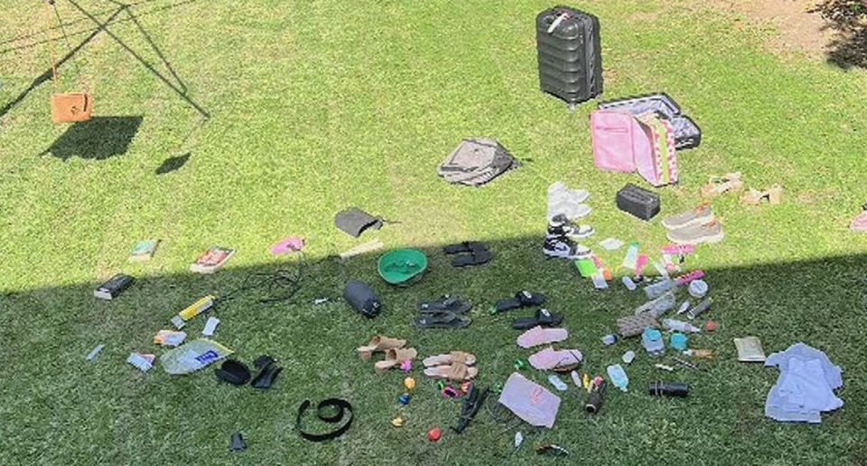 Monica Robertson's belongings on her lawn, after she said she slept in an bed bug infested room on a P&O Cruise. 