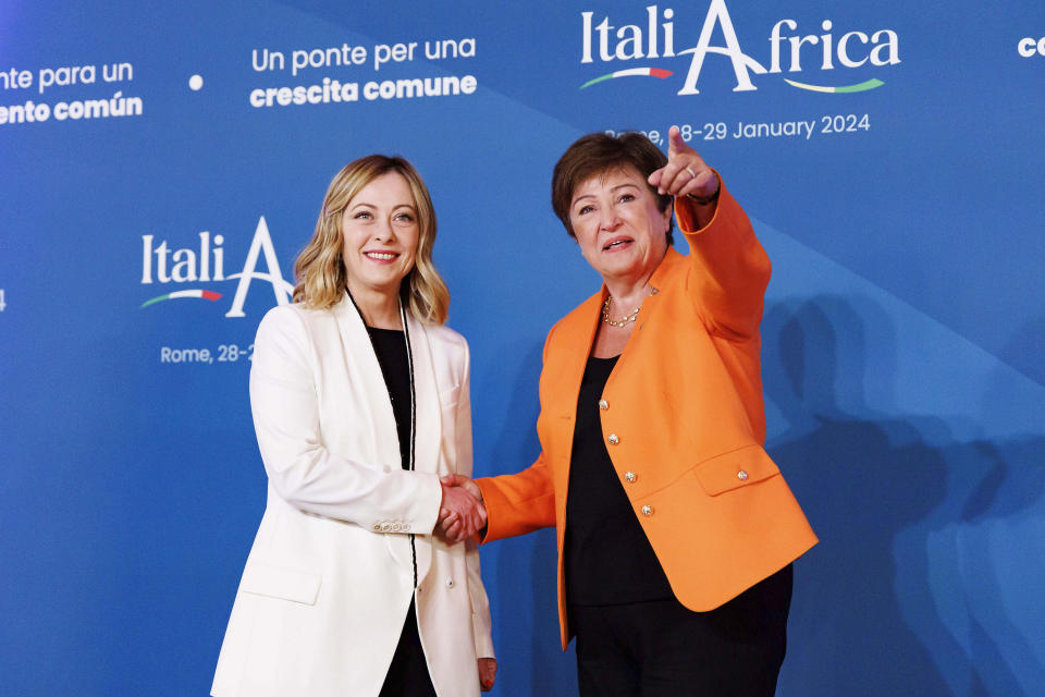 Italian Premier Giorgia Meloni, left, welcomes Kristalina Georgieva, Managing Director of the International Monetary Fund, on the occasion of an Italy - Africa summit, in Rome, Monday, Jan. 29, 2024. Meloni opened a summit of African leaders on Monday aimed at illustrating Italy's big development plan for the continent that her government hopes will stem migration flows and forge a new relationship between Europe and Africa. (Roberto Monaldo/LaPresse via AP)