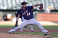Minnesota Twins' Dylan Bundy pitches against the Oakland Athletics during the first inning of a baseball game in Oakland, Calif., Tuesday, May 17, 2022. (AP Photo/Jed Jacobsohn)