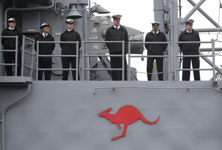 Navy personnel is seen as the Royal Australian Navy's Adelaide class guided missile frigate HMAS Melbourne (III) arrives at Qingdao Port for the 70th anniversary celebrations of the founding of the Chinese People's Liberation Army Navy (PLAN), in Qingdao, China April 21, 2019. REUTERS/Jason Lee