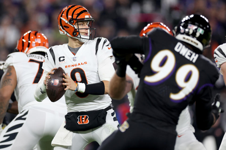 BALTIMORE, MARYLAND – NOVEMBER 16: Joe Burrow #9 of the Cincinnati Bengals looks to throw a pass against the Baltimore Ravens during the second quarter of the game at M&T Bank Stadium on November 16, 2023 in Baltimore, Maryland. (Photo by Patrick Smith/Getty Images)