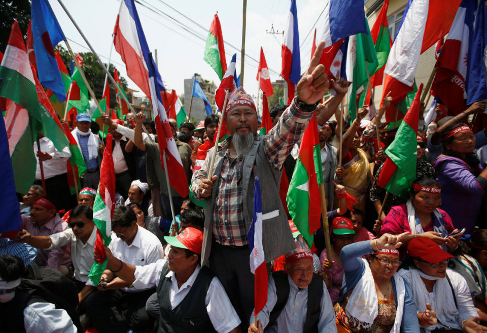 <p>Supporters of Federal Alliance, a coalition of Madhesi-based parties and other ethnic political parties and organizations, protest against the constitution near the prime minister’s official residence in Kathmandu, Nepal, on May 17, 2016. (Navesh Chitrakar/Reuters)</p>