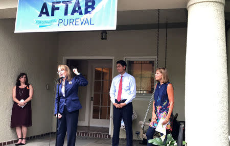 Gun safety advocate and former Democratic Congresswoman Gabby Giffords speaks at a campaign event for Democratic congressional candidate Aftab Pureval in Ohio's first congressional district, in North Avondale, Ohio, U.S., June 13, 2018. REUTERS/Tim Reid/Files