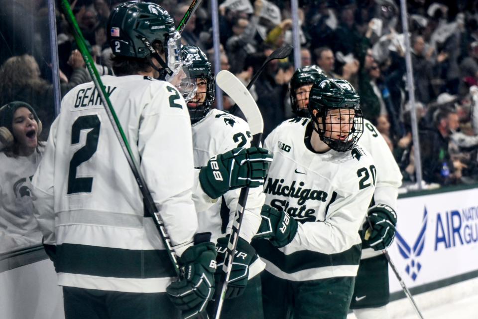 Michigan State's Daniel Russell, right, celebrates his goal against Ohio State in the second period of the Big Ten tournament game on Saturday, March 16, 2024, at Munn Arena in East Lansing.