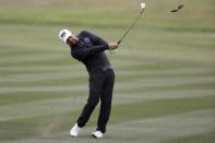 Apr 20, 2018; San Antonio, TX, USA; Ryan Moore hits from the fairway on the seventeenth hole during the second round of the Valero Texas Open golf tournament at TPC San Antonio - AT&T Oaks Course. Mandatory Credit: Soobum Im-USA TODAY Sports