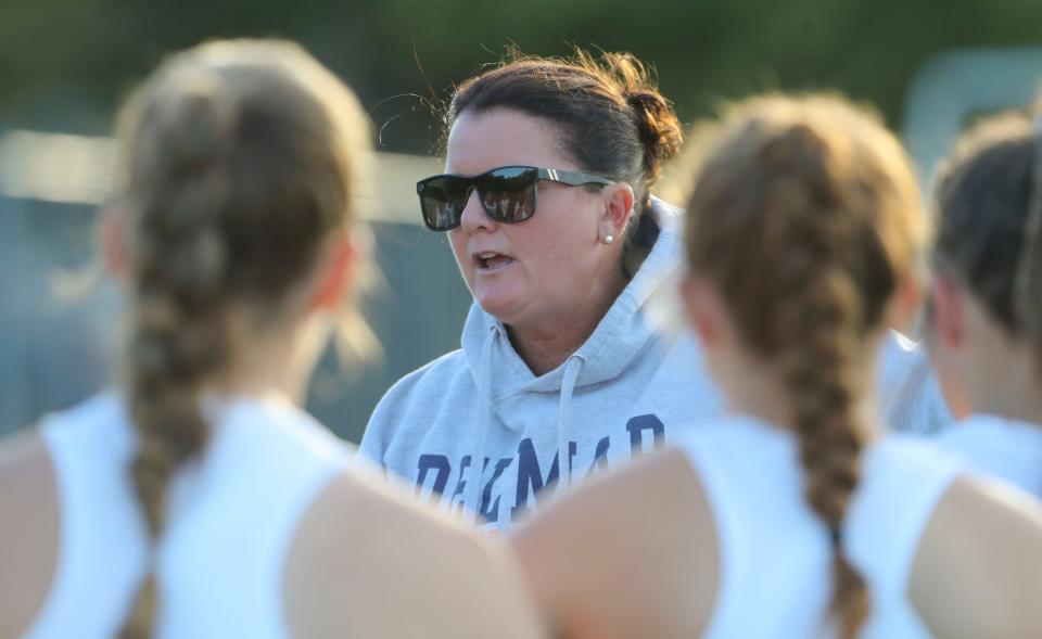 Delmar head coach Jodi Hollamon talks to her team in a timeout in the fourth quarter of the Wildcats' 2-1 win at Delmar High School, Thursday, Oct. 6, 2022.