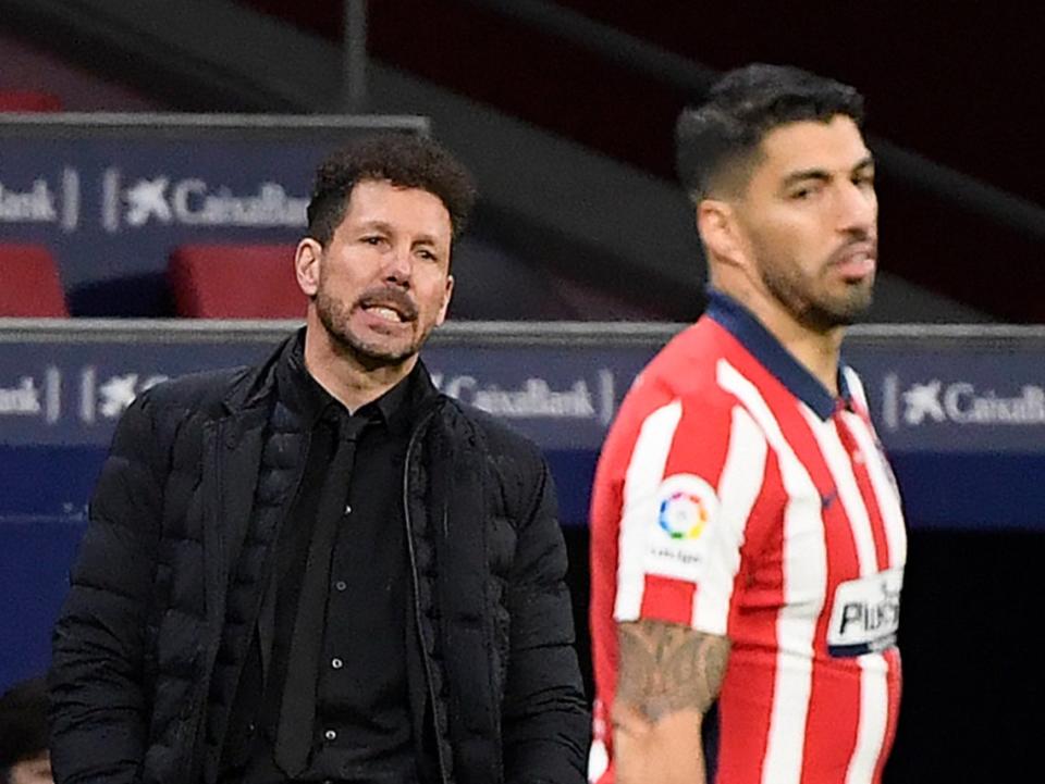 Atletico Madrid coach Diego Simeone and striker Luis Suarez (AFP via Getty Images)