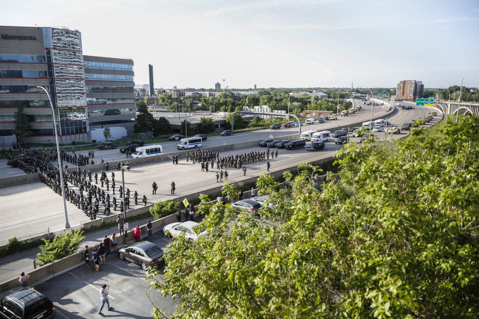 Highway 35W is closed by authorities after semi-truck was involved in an incident with protesters, Sunday, May 31, 2020, in St. Paul, Minn. Protests continued following the death of George Floyd, who died after being restrained by Minneapolis police officers on May 25. (AP Photo/John Minchillo)