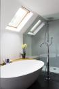 <p>Your eye will be drawn to the large freestanding bath first — but there's also a hidden shower space just behind. </p><p><a class="link " href="https://www.housebeautiful.com/uk/renovate/homes-makeovers/a1196/barn-conversion-renovation-modern-family-home/" rel="nofollow noopener" target="_blank" data-ylk="slk:TAKE A TOUR;elm:context_link;itc:0;sec:content-canvas">TAKE A TOUR</a></p>