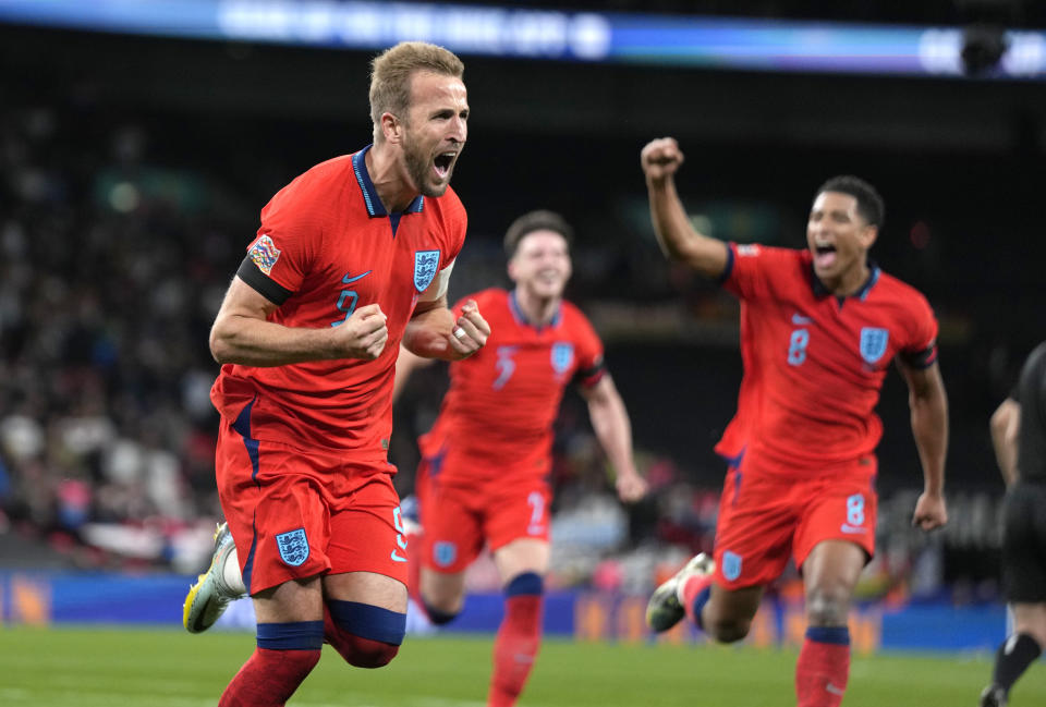 England's Harry Kane celebrates after scoring during the UEFA Nations League soccer match between England and Germany at the Wembley Stadium in London, England, Monday, Sept. 26, 2022. (AP Photo/Alastair Grant)