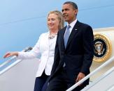 Former President Barack Obama and then-Secretary of State Hillary Clinton arrived Nov. 19, 2012, at Yangon International Airport in Yangon, Myanmar, on Air Force One. Voting rights experts said Obama's reelection bid that year helped boost Black voter turnout.