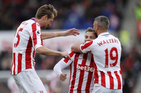 Britain Soccer Football - Stoke City v Hull City - Premier League - bet365 Stadium - 15/4/17 Stoke City's Xherdan Shaqiri celebrates scoring their third goal with Jonathan Walters and Peter Crouch Action Images via Reuters / Carl Recine Livepic