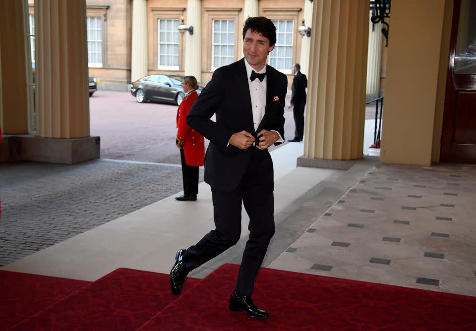 Justin arrives looking slick in a black suit for the event. Photo: Getty Images