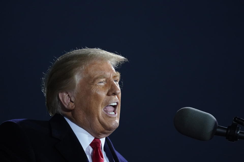 President Donald Trump speaks at a campaign rally at Des Moines International Airport, Wednesday, Oct. 14, 2020, in Des Moines, Iowa. (AP Photo/Alex Brandon)