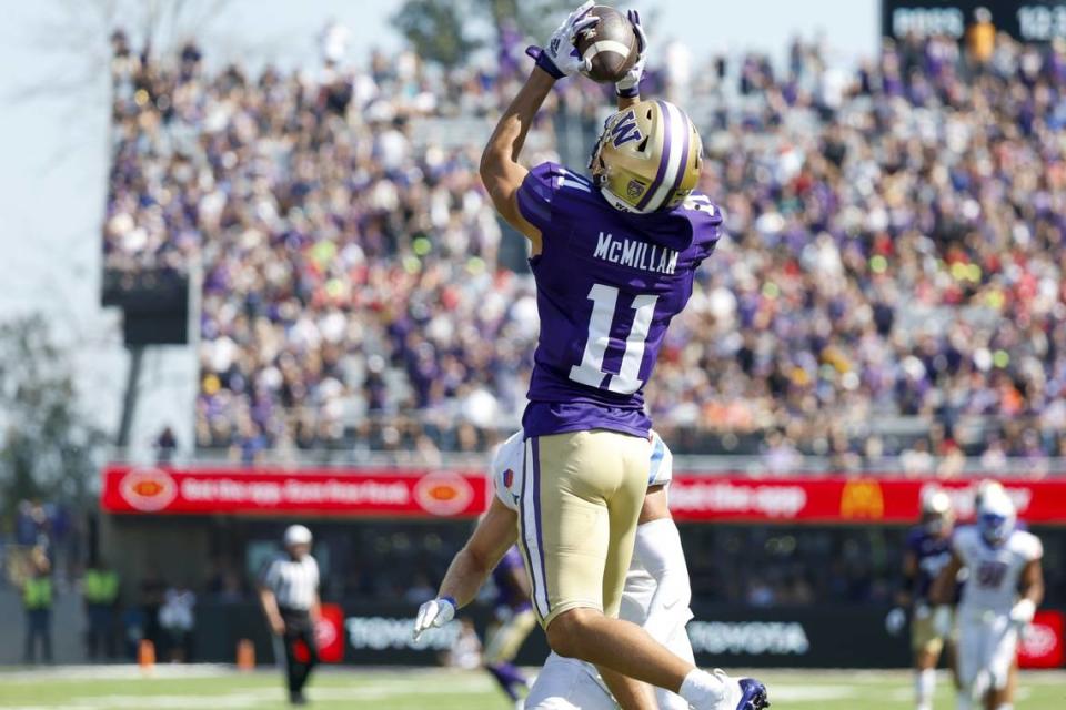 Sep 2, 2023; Seattle, Washington, USA; Washington Huskies wide receiver Jalen McMillan (11) catches a touchdown pass against the Boise State Broncos during the second quarter at Alaska Airlines Field at Husky Stadium. Mandatory Credit: Joe Nicholson-USA TODAY Sports