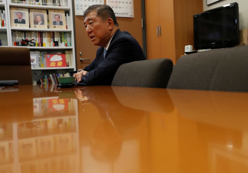 Japan's ruling Liberal Democratic Party lawmaker Shigeru Ishiba speaks during an interview with Reuters at his office in Tokyo