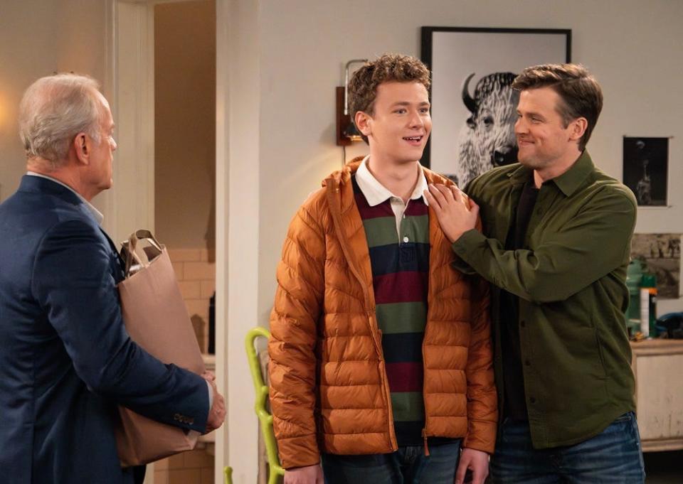 David (Anders Keith) in the middle of his Uncle Frasier (Kelsey Grammer) and cousin Freddy (Jack Cutmore-Scott).
