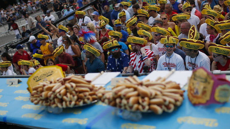 Plates of hot dogs, fans