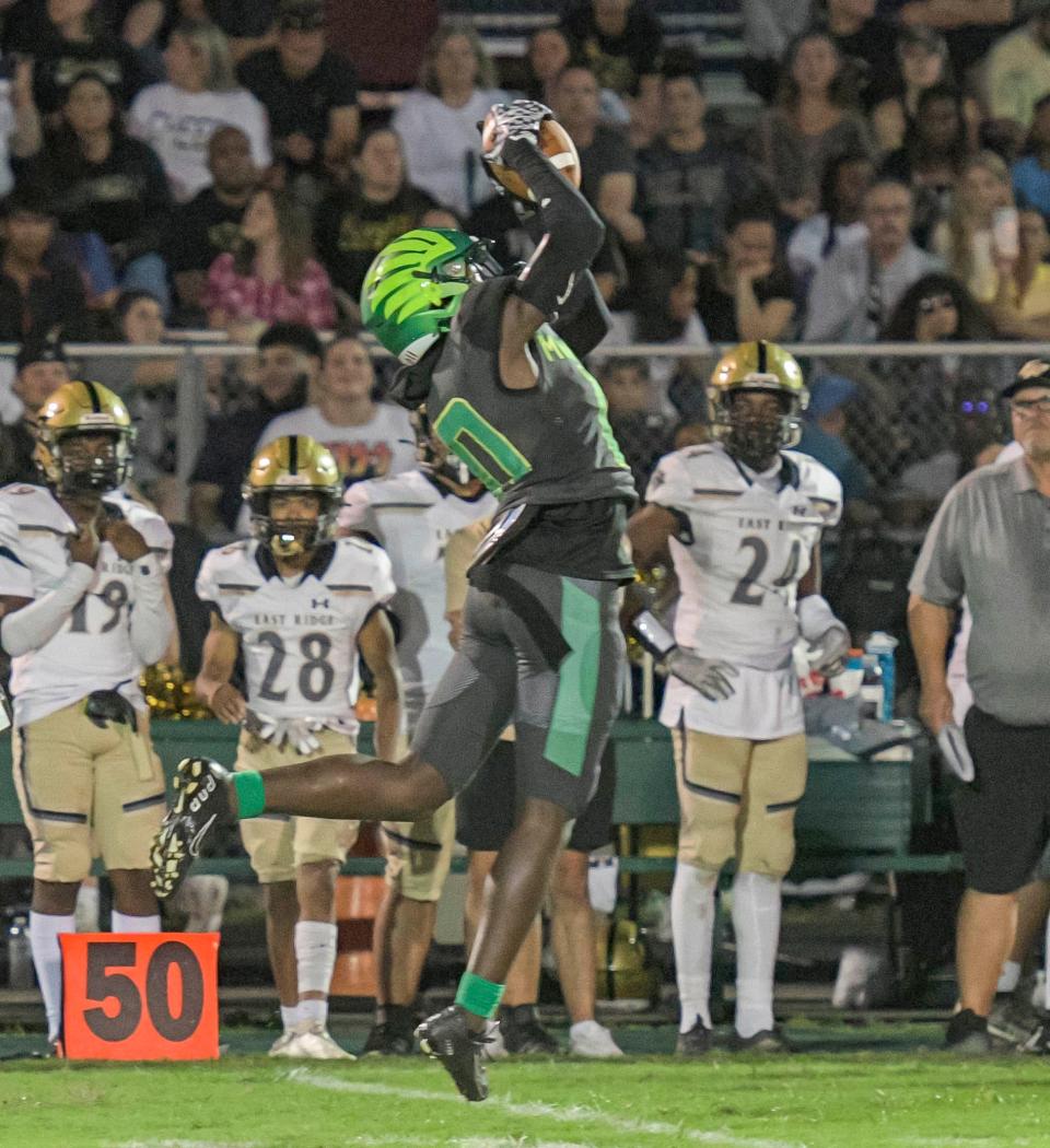 Lake Minneola’s Quentin Taylor (10) intercepts a pass during a game between Lake Minneola High School and East Ridge High School in Minneola on Friday, Sept. 16, 2022.