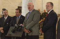 West Virginia Education Association President Dale Lee and other union leaders of the WVEA, AFT-WV and WVSSPA called for a statewide strike beginning tomorrow at a press conference outside of the Senate chamber at the West Virginia State Capitol in Charleston, W.Va., on Monday, Feb. 18, 2019. (Craig Hudson/Charleston Gazette-Mail via AP)