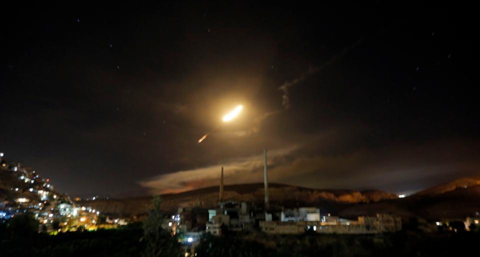 <p>Syrian air defense missiles are seen in the sky over the capital Damascus, Syria, 10 May 2018. According to Syrian official media reports, the air defense was responding to a new wave of Israeli missile strikes. (Photo: Youssef Badawi/EPA-EFE/REX/Shutterstock) </p>