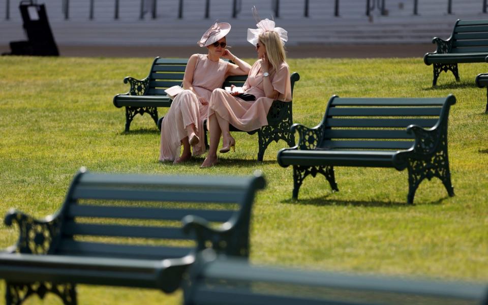 Racegoers enjoy the sun during day one Royal Ascot - PA