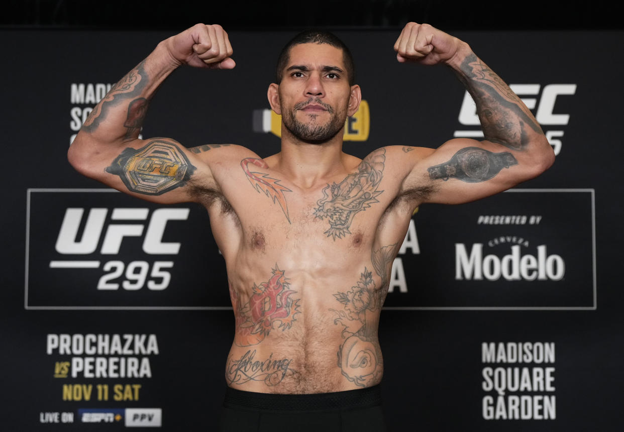 NEW YORK, NEW YORK - NOVEMBER 10: Alex Pereira of Brazil poses on the scale during the UFC 295 official weigh-in at New York Marriott Marquis on November 10, 2023 in New York City. (Photo by Jeff Bottari/Zuffa LLC via Getty Images)