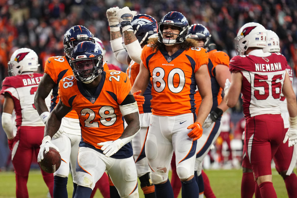 Denver Broncos running back Latavius Murray (28) celebrate his touchdown against the Arizona Cardinals during the second half of an NFL football game, Sunday, Dec. 18, 2022, in Denver. (AP Photo/Jack Dempsey)