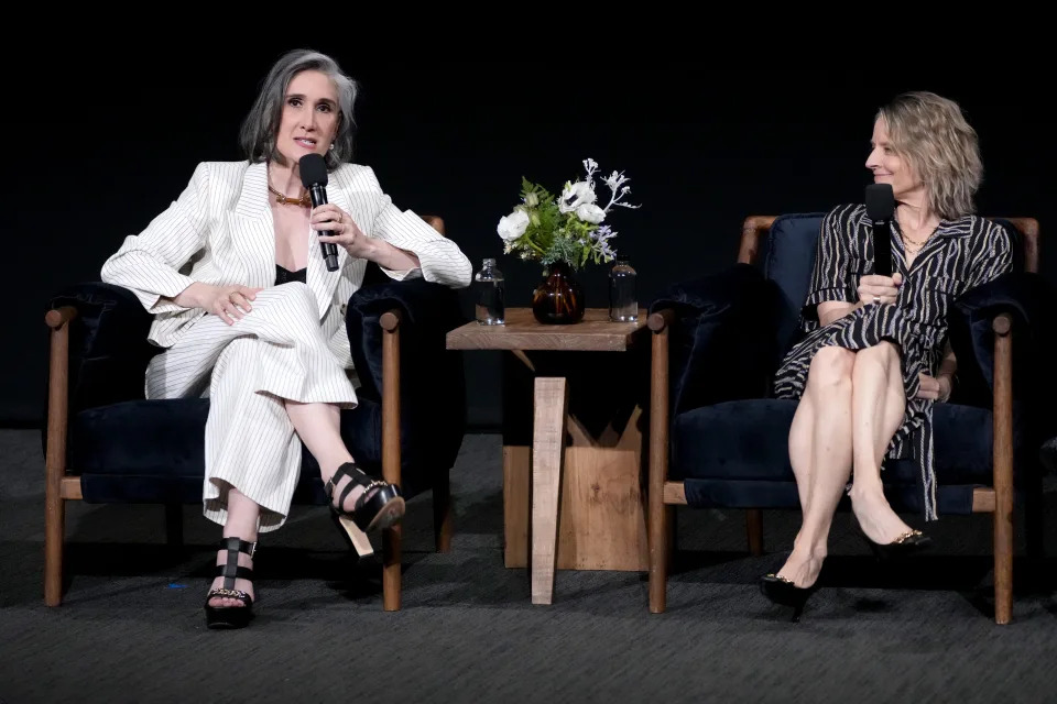 Jodie Foster speaks onstage at the "True Detective: Night Country" FYC Screening wearing a pair of pointed pumps