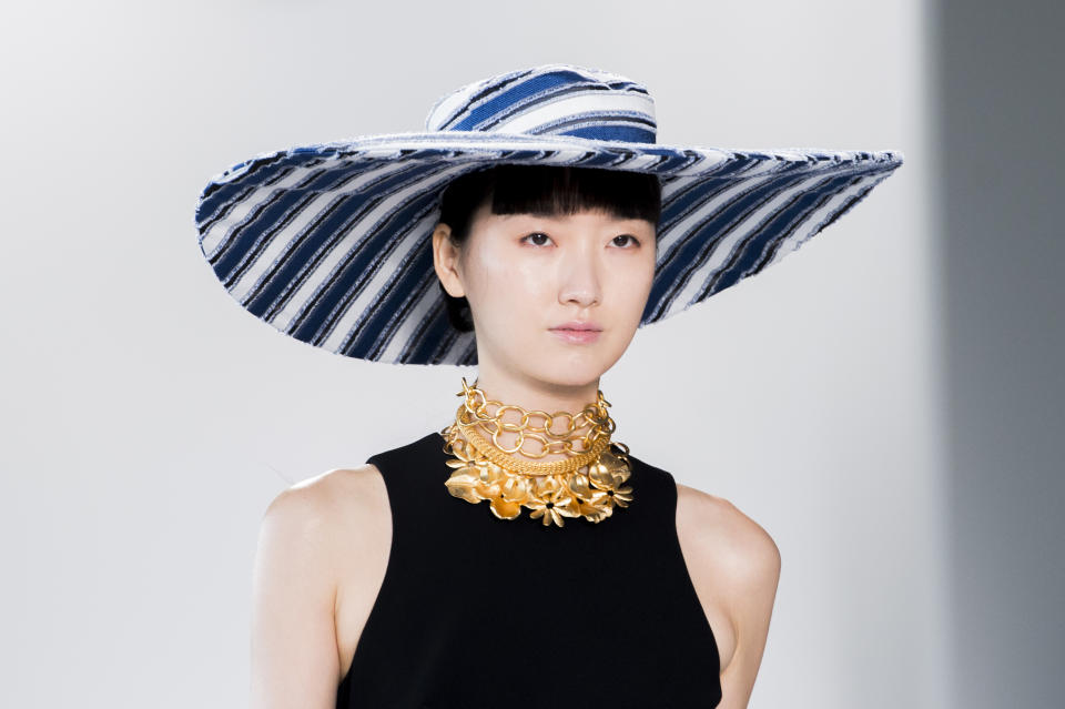 <p><i>Blue-and-white-striped hat from the SS18 Christian Siriano collection. (Photo: ImaxTree) </i></p>