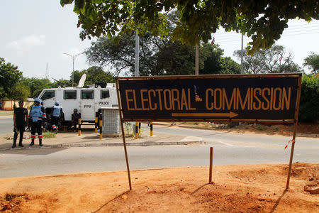 Security forces members stand guard near the electoral commission in Accra, Ghana December 9, 2016. REUTERS/Luc Gnago