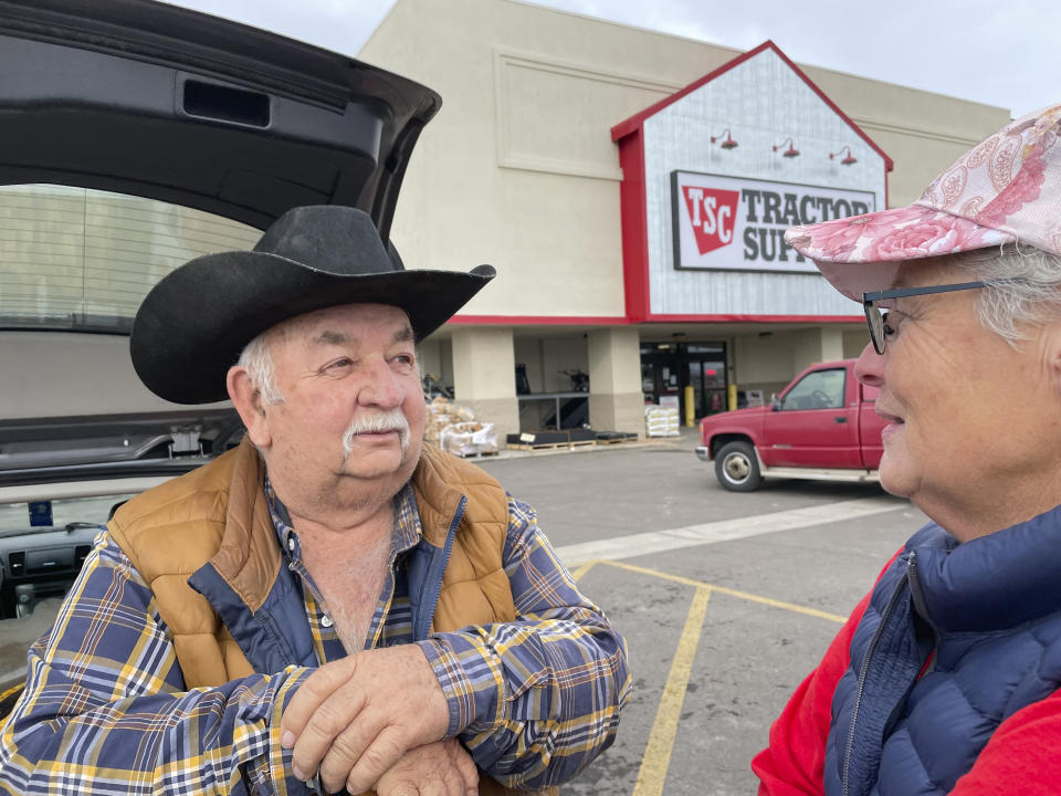 Larry Clark talks outside a supply store on Friday, Dec. 30, 2022, in Grand Junction, Colo. (AP Photo/Jesse Bedayn)