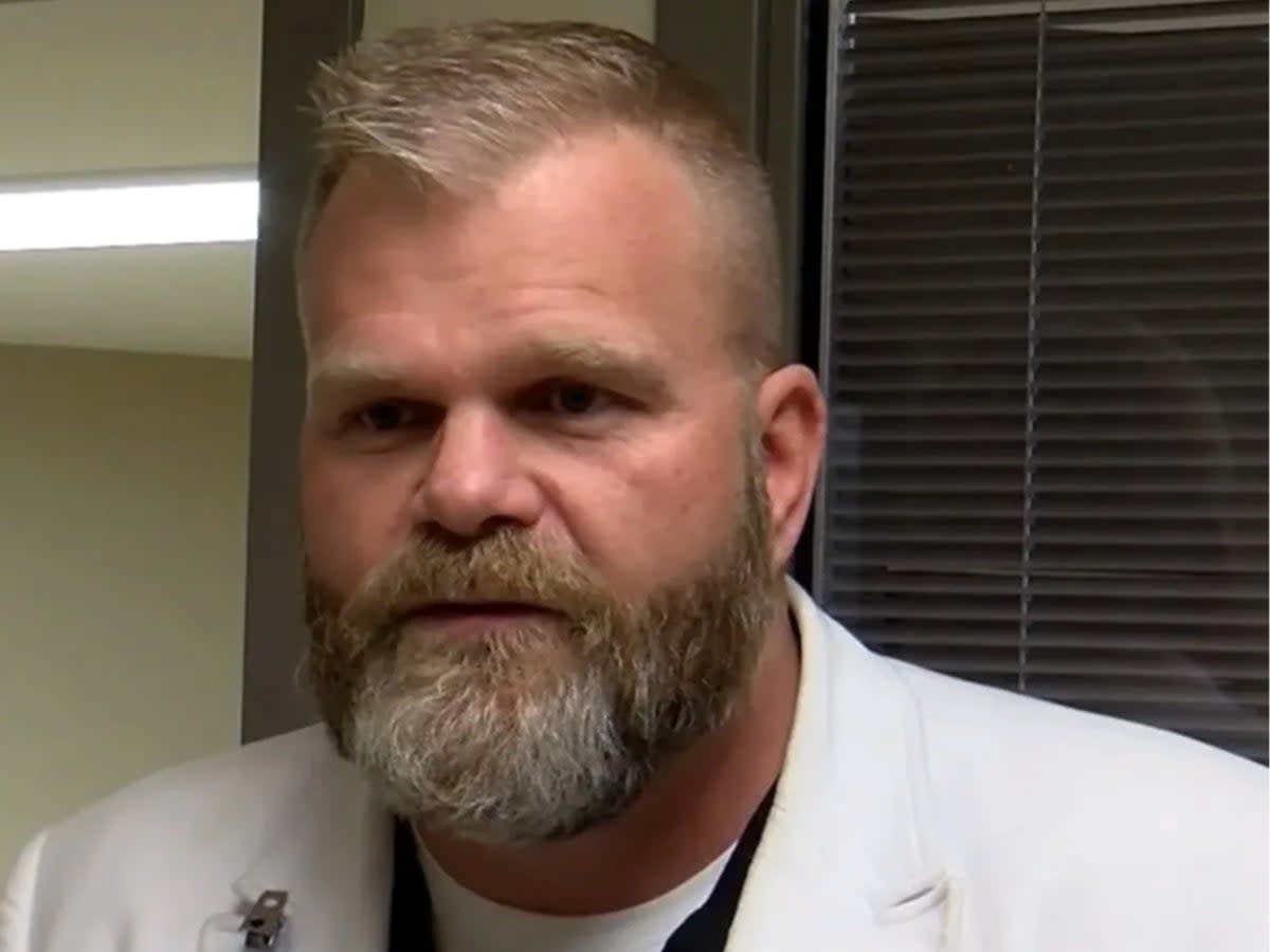 Dr Brian Hyatt, former chairman of the Arkansas State Medical Board, has been accused of falsely imprisoning patients as part of an alleged Medicare scam (screengrab/ KNWA)