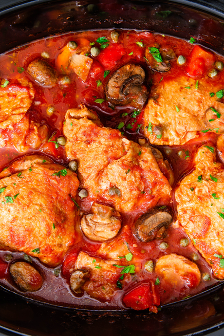 <p>Chicken cacciatore is the perfect candidate for a slow cooker meal because it only improves with time. The long cook time gives the aromatic veggies and herbs a chance to meld together, creating a bright, earthy stew. </p><p>Get the <a href="https://www.delish.com/uk/cooking/recipes/a30208240/slow-cooker-chicken-cacciatore-recipe/" rel="nofollow noopener" target="_blank" data-ylk="slk:Slow Cooker Chicken Cacciatore;elm:context_link;itc:0" class="link ">Slow Cooker Chicken Cacciatore</a> recipe.</p>