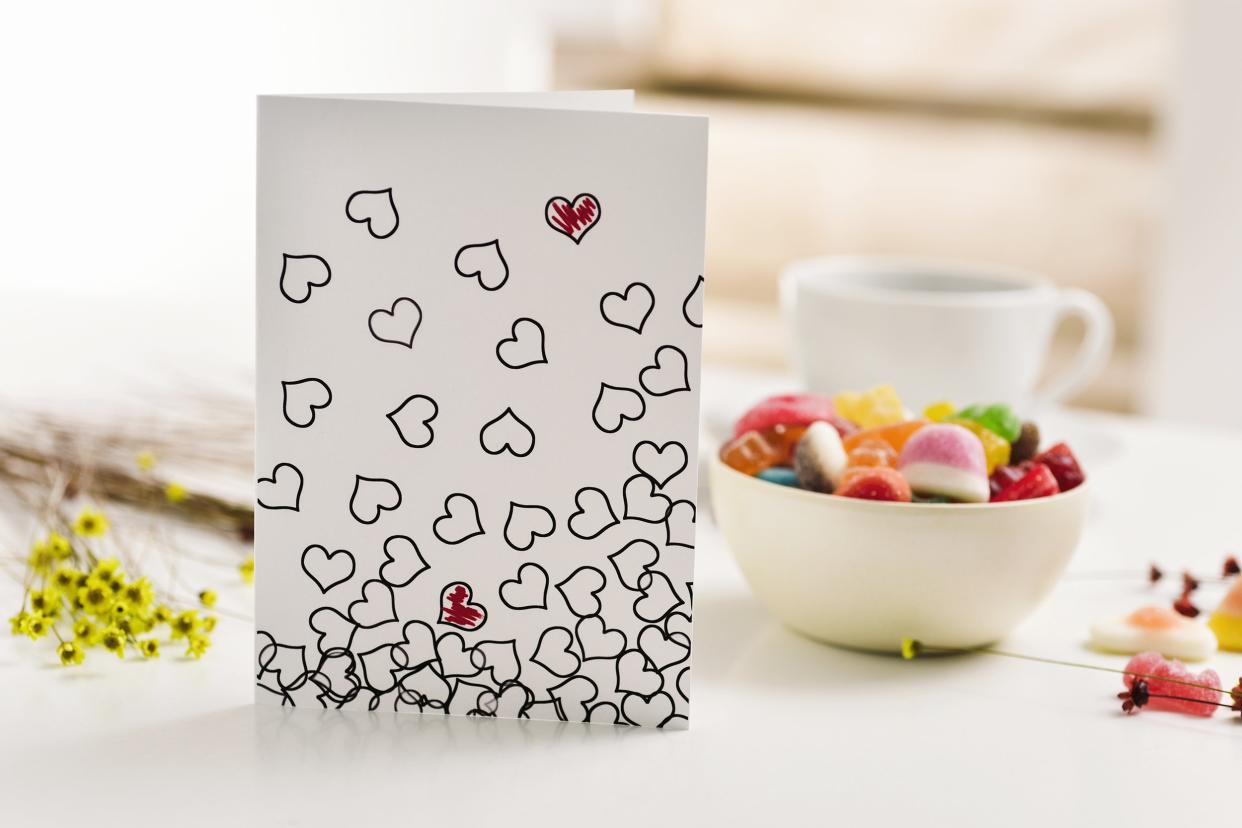 greeting card with some hearts on a table