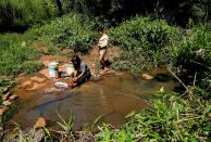 Rains hitting their lowest level in decades sap the water source for the mighty Parana River