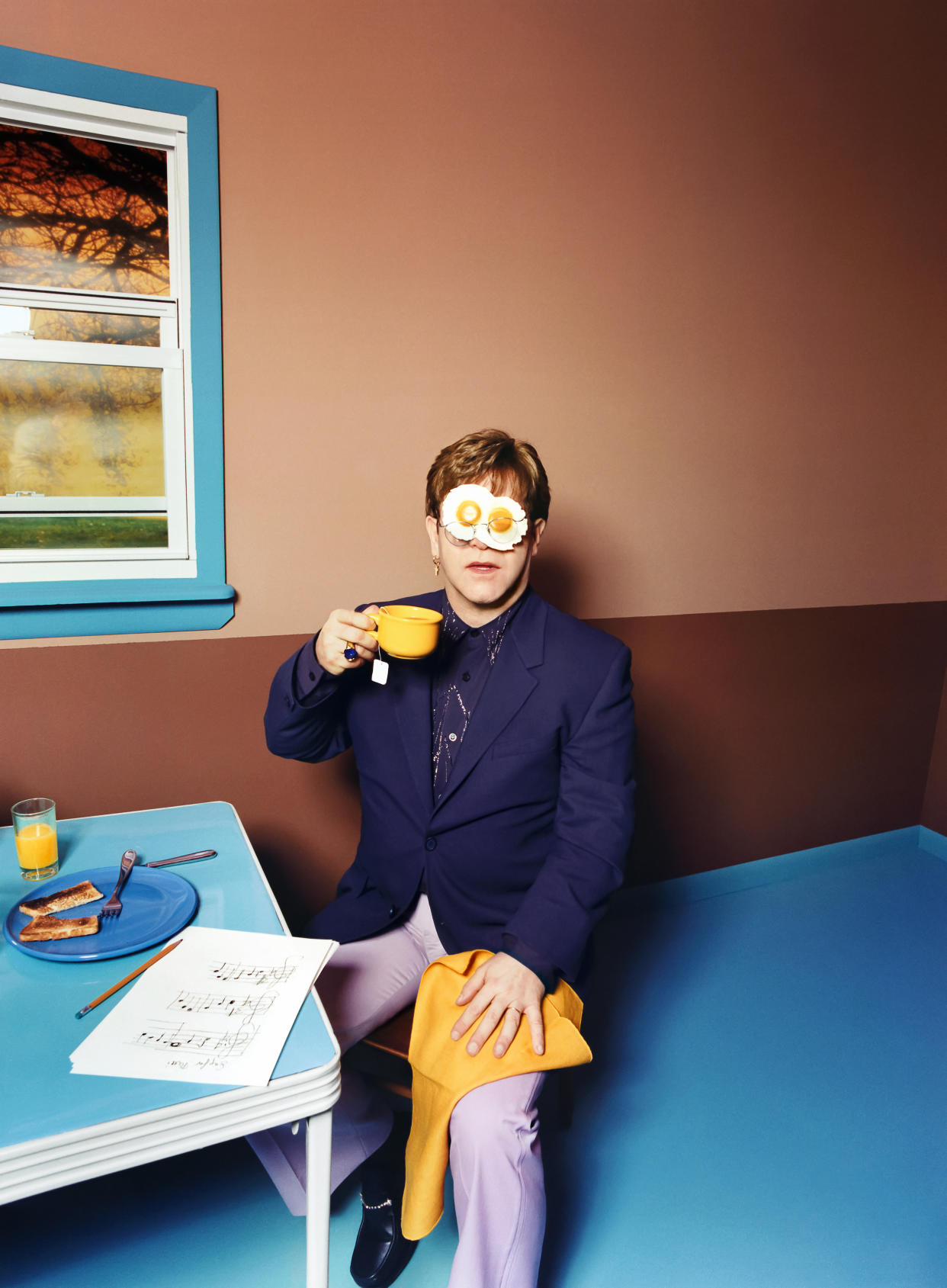 David LaChapelle’s Elton John: Egg On His Face, New York, 1999 will be on display (David LaChapelle/V&A/PA)