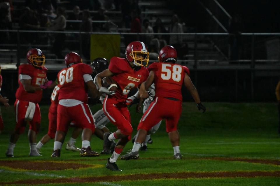 Senior Adair Ponce, last season’s Most Valuable Player on defense for Coast Union High School, in Cambria, carries the ball. Ponce hustled 50 yards around the left end for the home team’s second score against the Riverdale Christian Ambassadors on Thursday, Aug. 31, 2023.